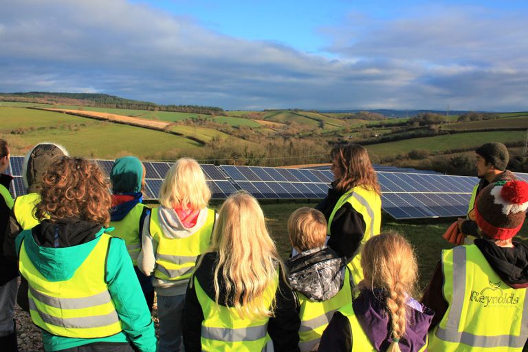School visit overlooking solar farm